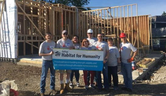 Volunteering with Habitat for Humanity at a site in Hanover Park, Illinois.