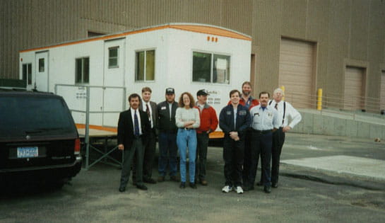 Group photo from 1997 of the employees at the Associated office in Eagan, MN