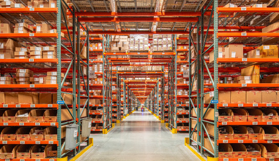 Warehouse Space Utilization - image looking down an aisle of a warehouse