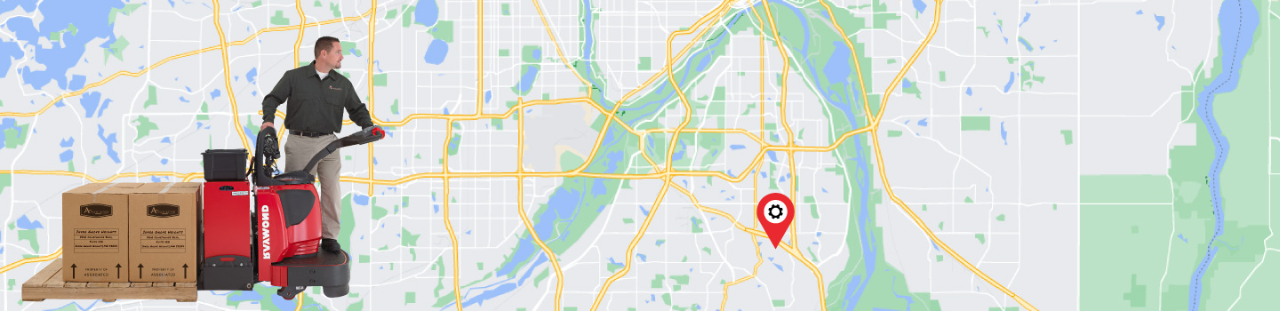 A man operates a pallet jack towing moving boxes. A map of the Twin Cities area is the background.
